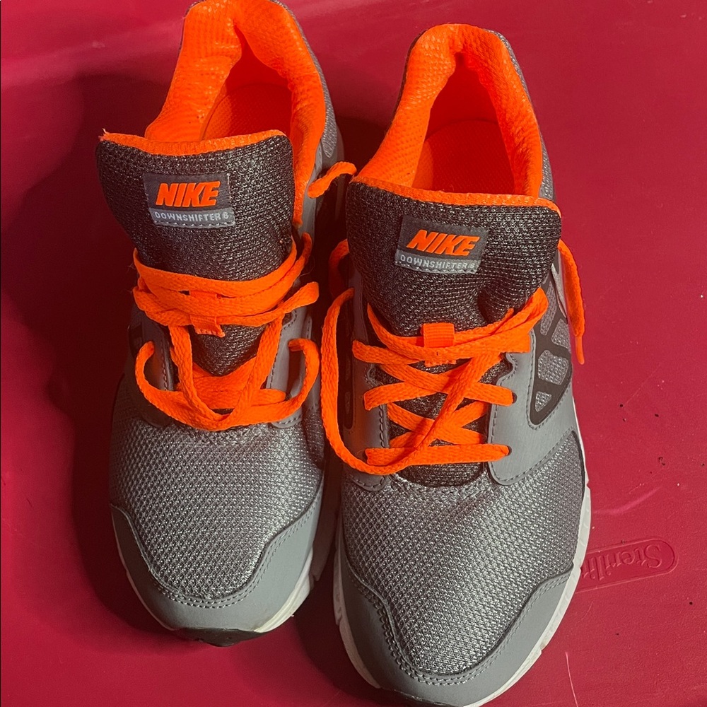 Nike orange and grey sneakers
